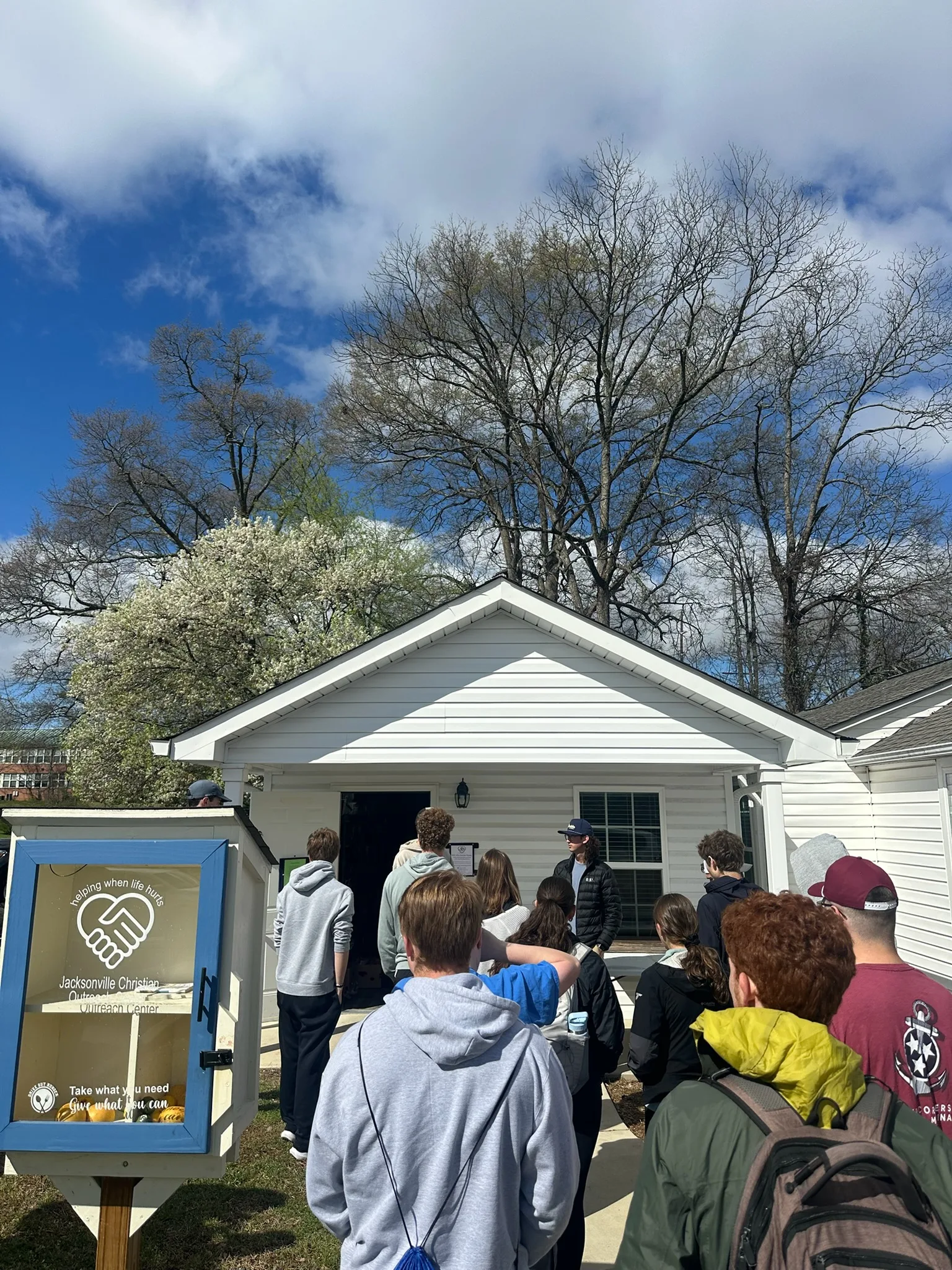 Volunteers arriving at JCOC on a spring day
