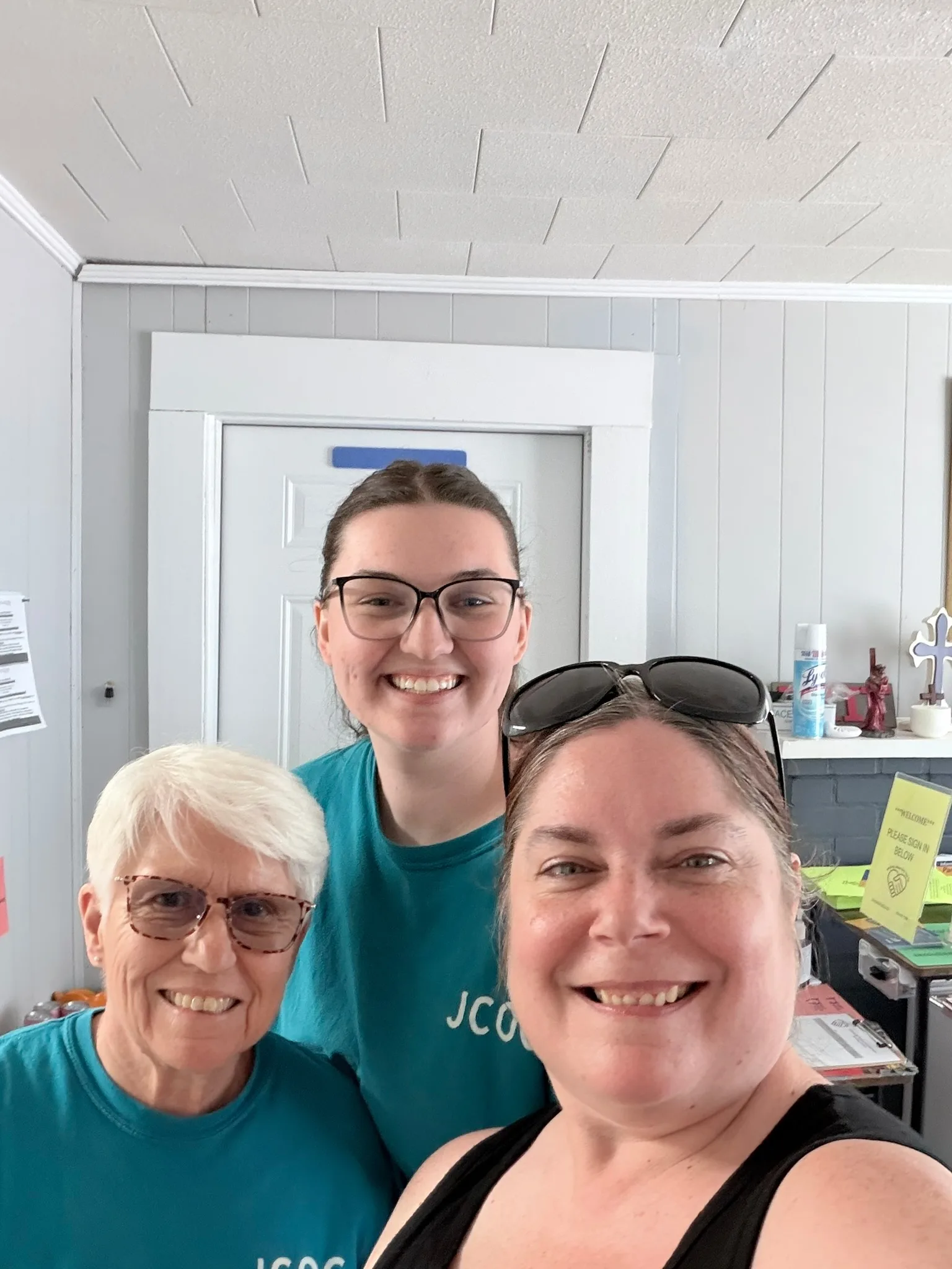 Summer Jennings and JCOC volunteers smiling